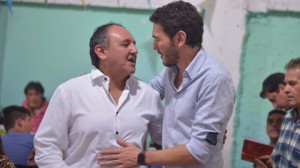 Fabián Ríos junto a Gainza.