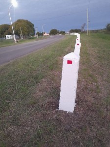 Señalización en el acceso a El Palenque